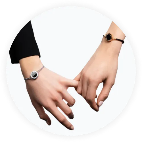 Two friends wearing Cerret safety bracelets in silver and rose gold